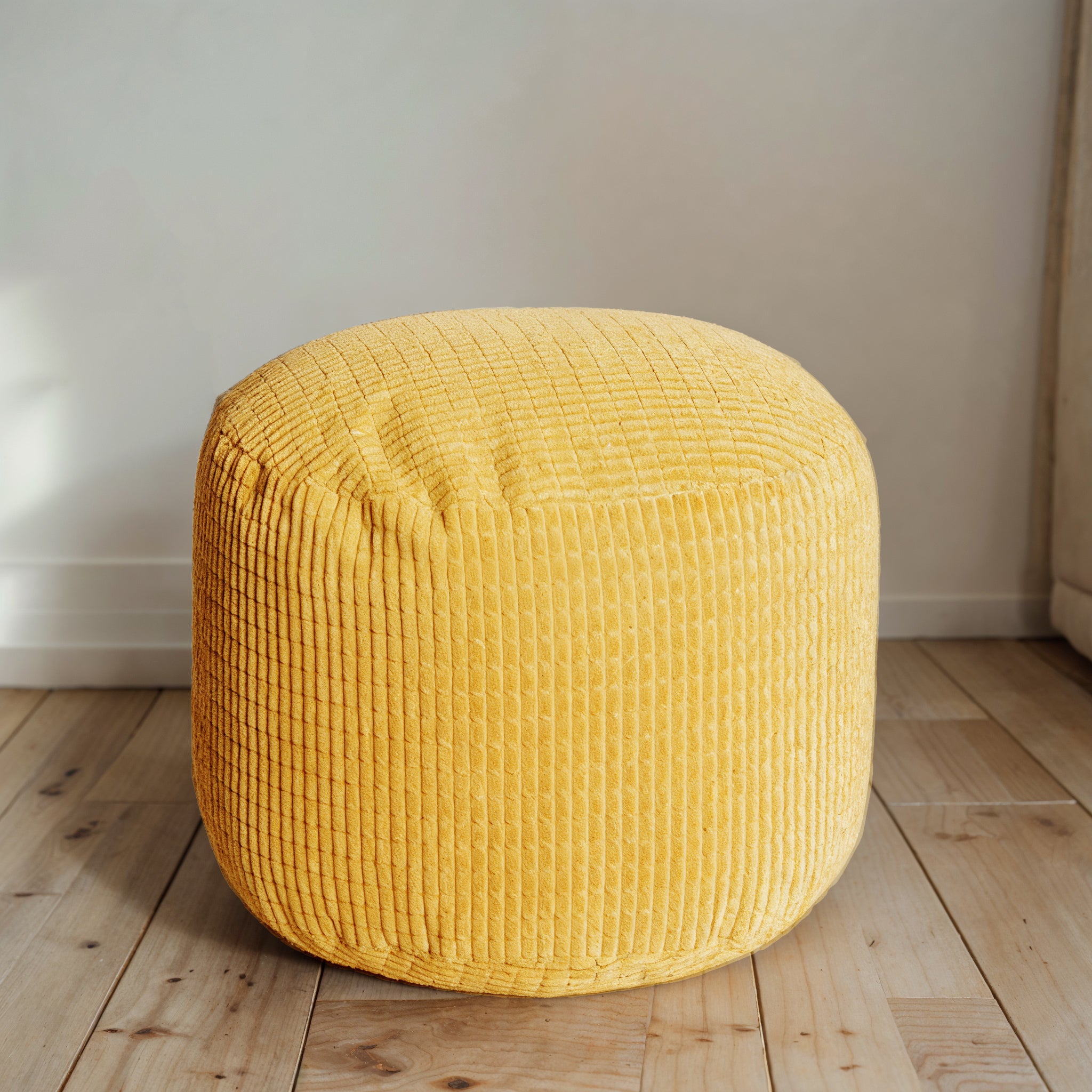 Luxury round split jumbo cord footstool